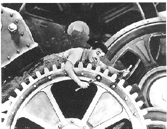 Charlie Chaplin in "Tempi moderni" - 1936